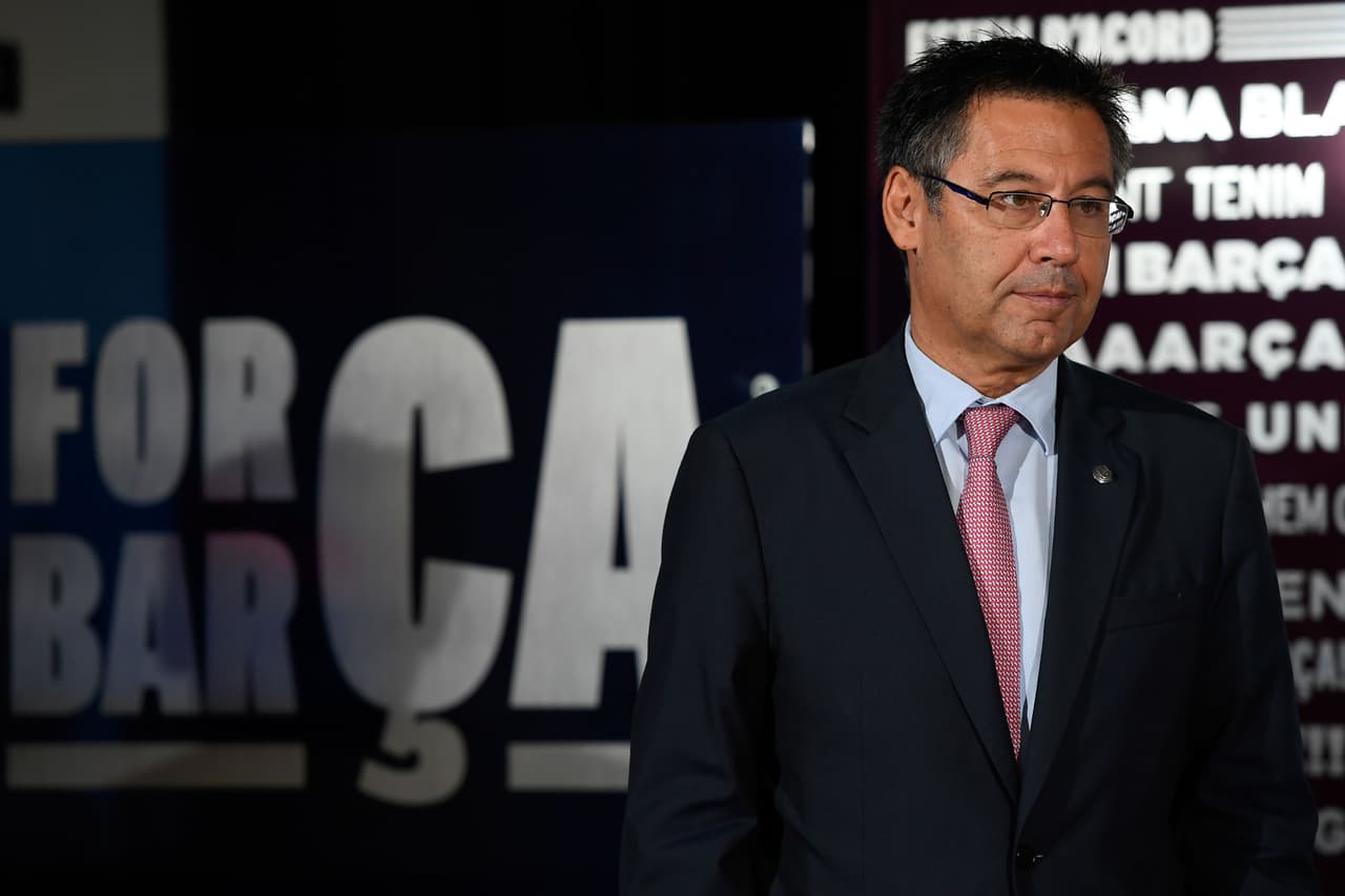 Barcelona's president Josep Maria Bartomeu looks on during the official presentation of Barcelona's new Brazilian football player Paulinho Bezerra, after signing his new contract with the Catalan club at the Camp Nou stadium in Barcelona on August 17, 2017. / AFP PHOTO / LLUIS GENE (Photo credit should read LLUIS GENE/AFP/Getty Images)
