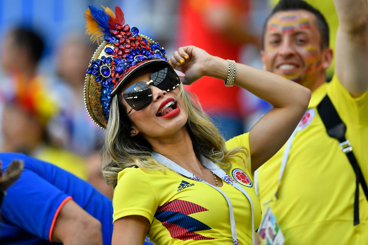 A Colombian fan waits for the start of the group H match between Senegal and Colombia, at the 2018 soccer World Cup in the Samara Arena in Samara, Russia, Thursday, June 28, 2018. (AP Photo/Martin Meissner)
