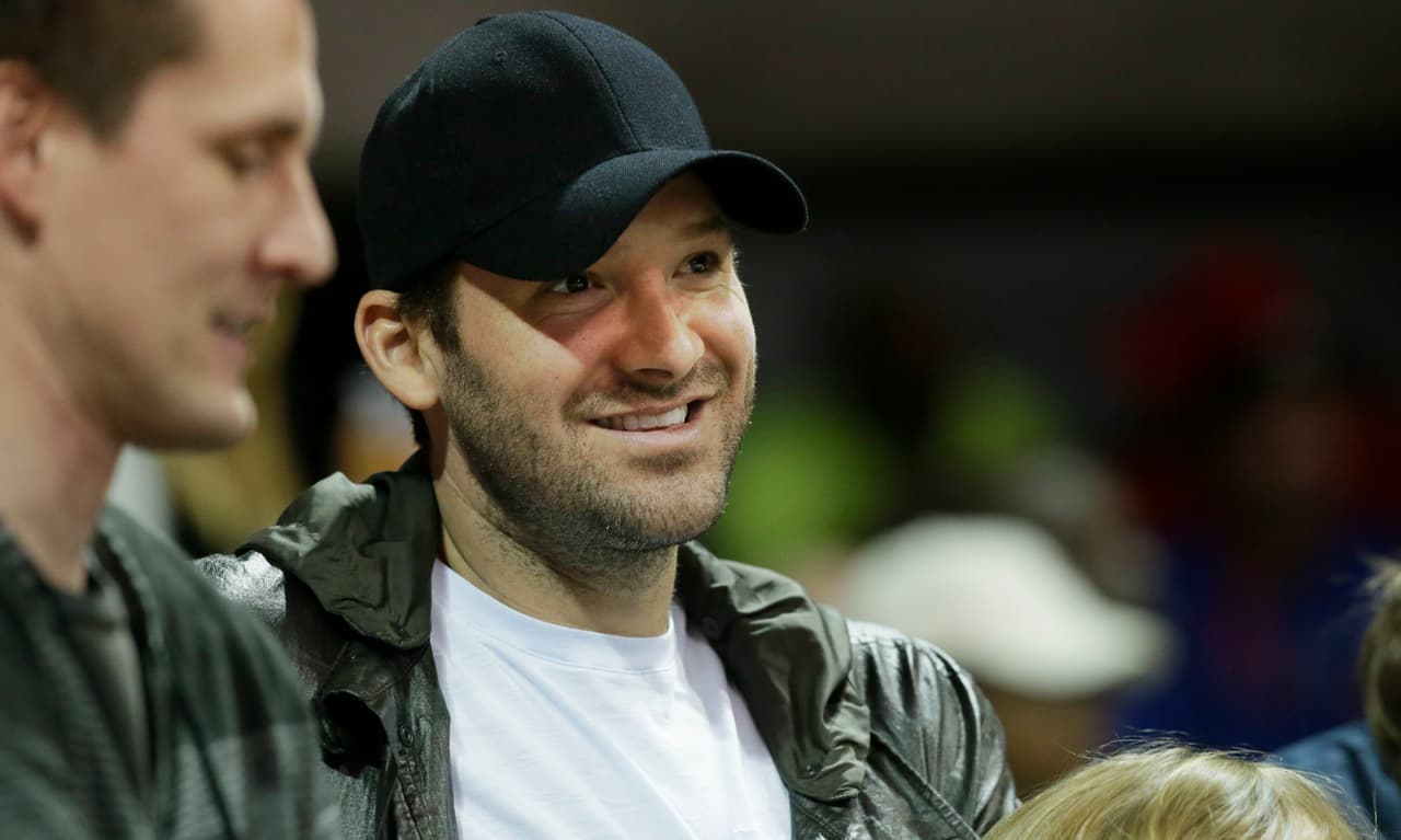 Dallas Cowboys quarterback Tony Romo watches during the first half of an NCAA college basketball game between Cincinnati and SMU in Dallas, Sunday, Feb. 12, 2017. (AP Photo/LM Otero)