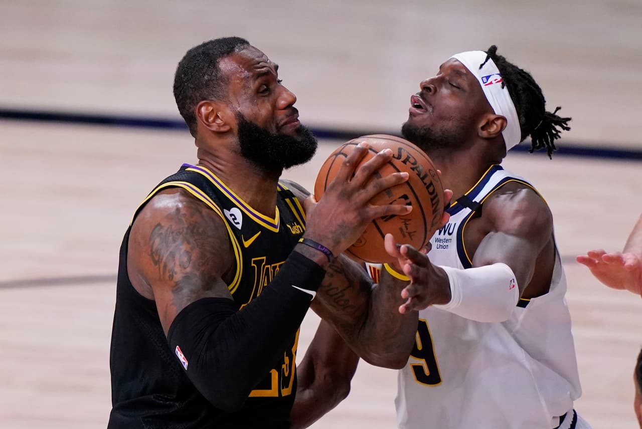 Anthony Davies anota 31 puntos y encesta la canasta que le da el triunfo a los Lakers 103-105 sobre los Denver Nuggets.