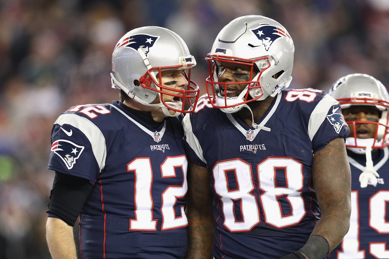 FOXBORO, MA - DECEMBER 12: Tom Brady #12 of the New England Patriots reacts with Martellus Bennett #88 after scoring a touchdown during the third quarter against the Baltimore Ravens at Gillette Stadium on December 12, 2016 in Foxboro, Massachusetts. (Photo by Maddie Meyer/Getty Images)