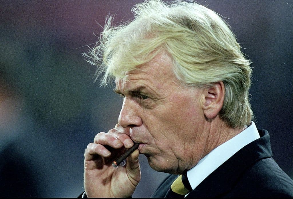 29 Sep 1998: Feyenoord coach Leo Beenhaker enjoys a smoke during the match between Feyenoord v Vfb Stuttgart in the UEFA Cup, First Leg, Second Round, played at the Feyenoord Stadium, Rotterdam, Holland. Vfb Stuttgart won 4-3 on aggregate. \ Mandatory Credit: Mark Thompson /Allsport