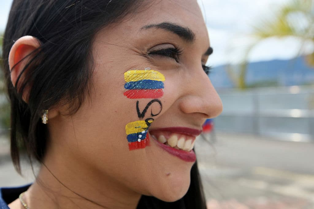 SAN CRISTOBAL, VENEZUELA - AUGUST 31: A fan of Colombia smiles prior a match between Venezuela and Colombia as part of FIFA 2018 World Cup Qualifiers at Pueblo Nuevo Stadium on August 31, 2017 in San Cristobal, Venezuela. (Photo by Marcos Colina/Getty Images)
