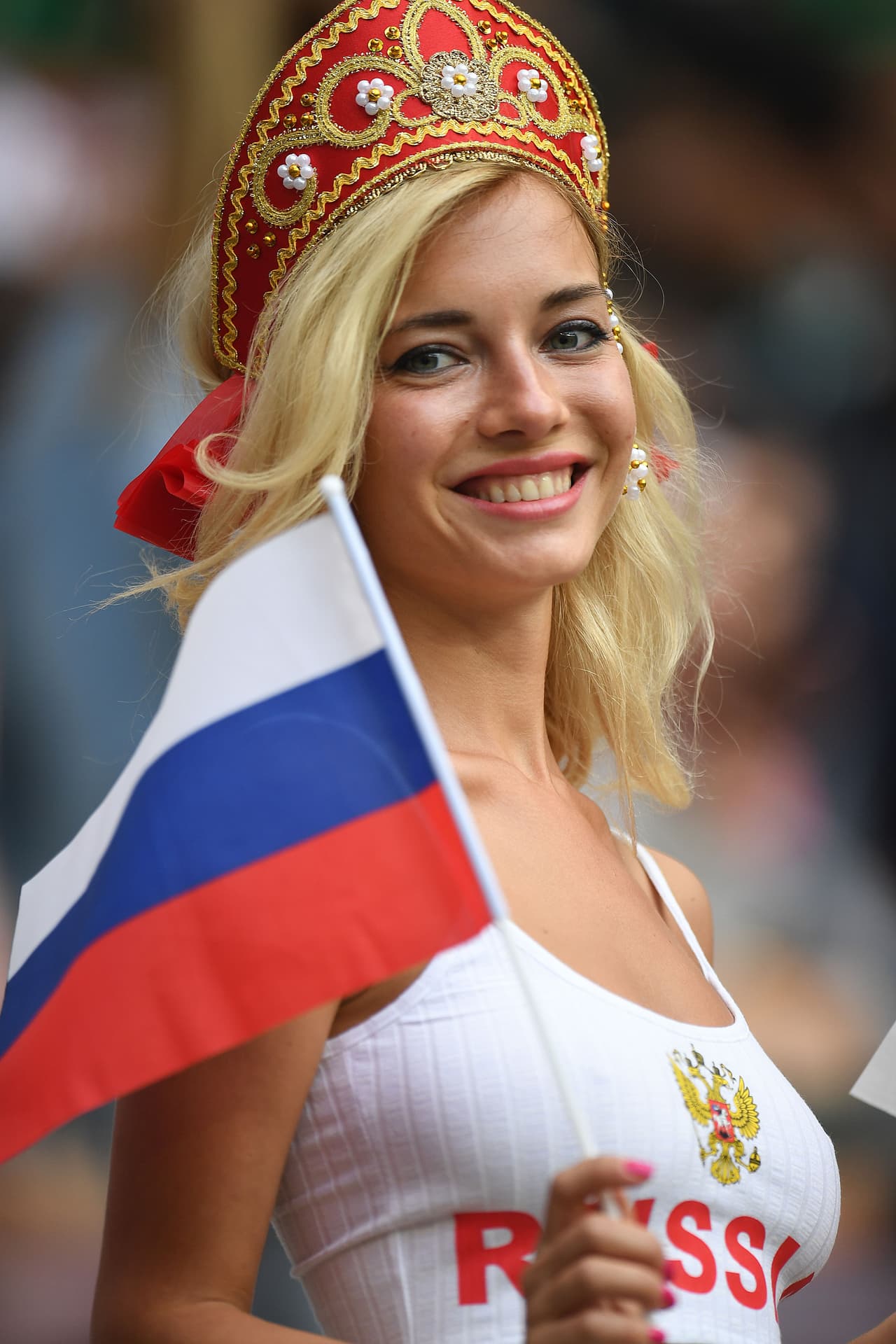 A Russia fan poses before the start of the Russia 2018 World Cup Group A football match between Russia and Saudi Arabia at the Luzhniki Stadium in Moscow on June 14, 2018. (Photo by Patrik STOLLARZ / AFP) / RESTRICTED TO EDITORIAL USE - NO MOBILE PUSH ALERTS/DOWNLOADS (Photo credit should read PATRIK STOLLARZ/AFP/Getty Images)