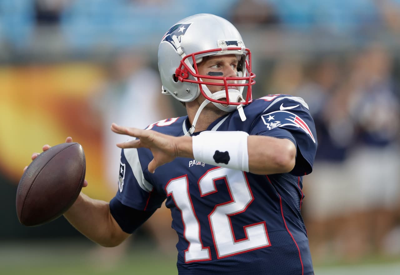 CHARLOTTE, NC - AUGUST 26: Tom Brady #12 of the New England Patriots warms up prior to their game against the Carolina Panthers during their game at Bank of America Stadium on August 26, 2016 in Charlotte, North Carolina. (Photo by Streeter Lecka/Getty Images)