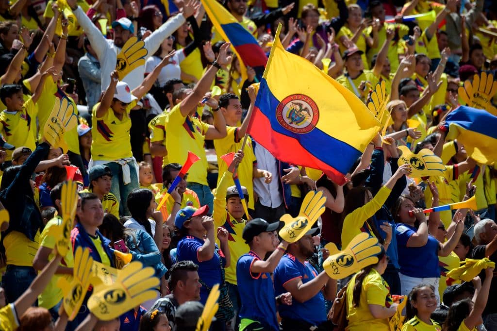 People wait at the Nemesio Camacho "El Campin" stadium in Bogota, where the Colombian national football team will be welcomed after their participation in the FIFA World Cup, on July 5, 2018. - England beat Colombia in a dramatic penalty shootout in Moscow on July 3 to reach the World Cup quarter-finals. (Photo by Raul ARBOLEDA / AFP) (Photo credit should read RAUL ARBOLEDA/AFP/Getty Images)
