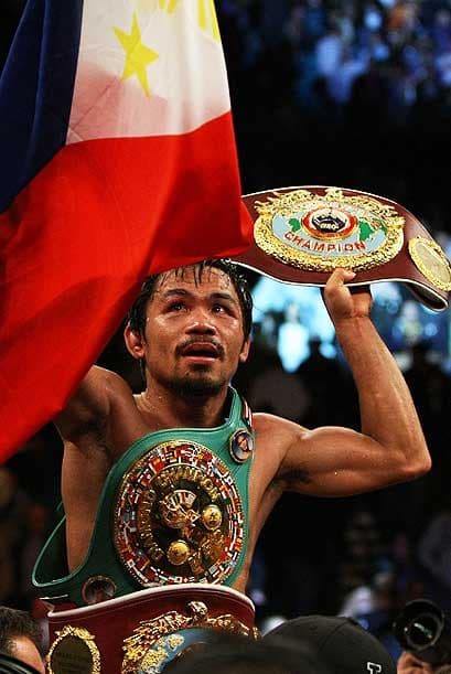 Manny Pacquiao se coronó campeón welter OMB y también se ciñó el primer Cinturón de Diamante del CMB de la historia.