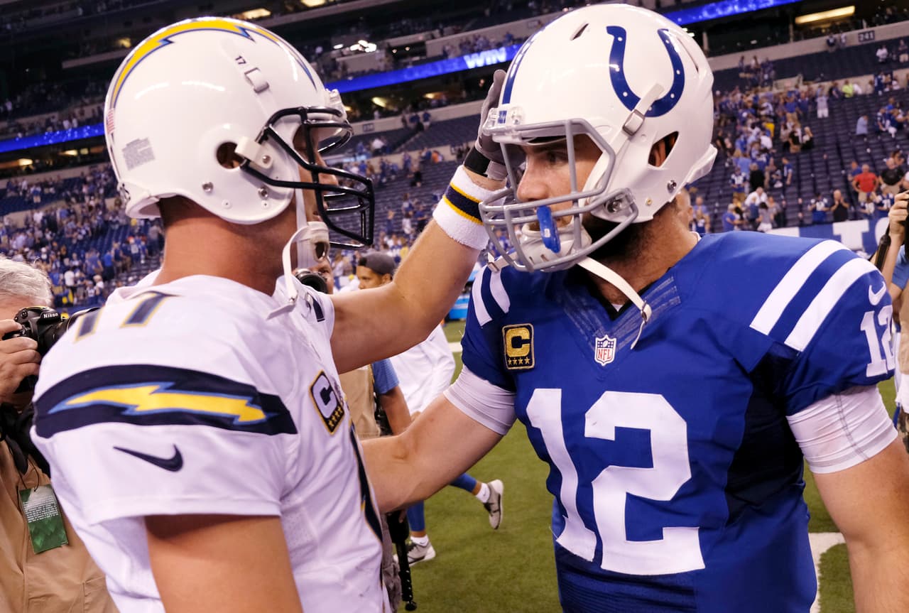 Indianapolis Colts' Andrew Luck (12) is congratulated by San Diego Chargers' Philip Rivers (17) following an NFL football game, Sunday, Sept. 25, 2016, in Indianapolis. Indianapolis won the game 26-22. (AP Photo/AJ Mast)