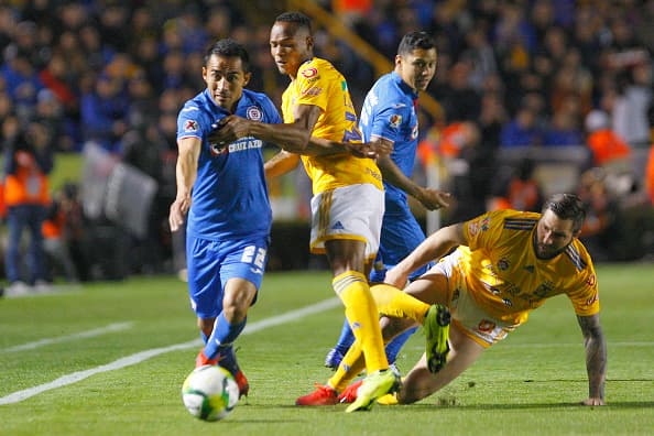 MONTERREY, MEXICO - JANUARY 19: Rafael Baca (L) of Cruz Azul fights for the ball with Francisco Meza (R) of Tigres during the third round match between Tigres UANL and Cruz Azul as part of the Torneo Clausura 2019 Liga MX at Universitario Stadium on January 19, 2019 in Monterrey, Mexico. (Photo by Alfredo Lopez/Jam Media/Getty Images)