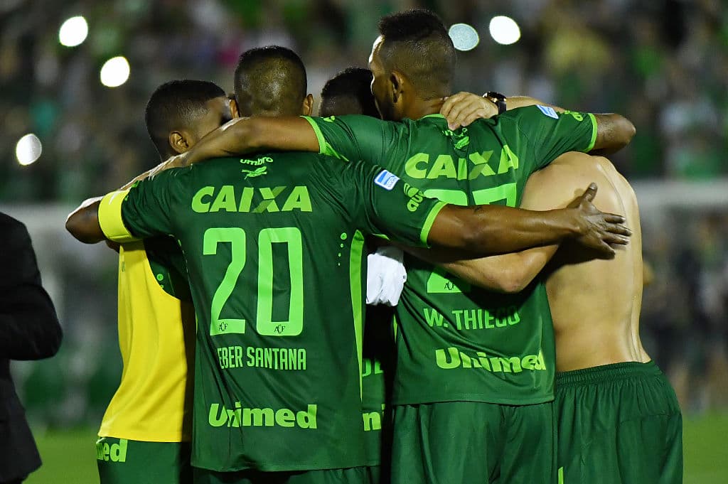 Brazil's Chapecoense footballers celebrate after defeating Argentina's San Lorenzo during their 2016 Copa Sudamericana their 2016 Copa Sudamericana semifinal second leg football match held at Arena Conda stadium, in Chapeco, Brazil, on November 23, 2016. / AFP / NELSON ALMEIDA (Photo credit should read NELSON ALMEIDA/AFP/Getty Images)