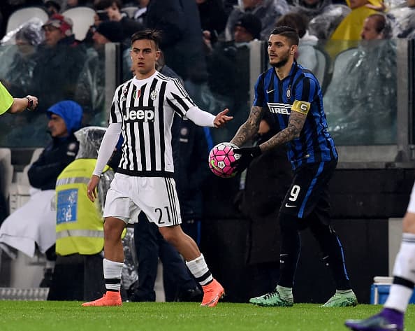 TURIN, ITALY - FEBRUARY 28: Mauro Icardi of FC Internazionale and Paulo Dybala of Juventus (L) during the Serie A match between Juventus FC and FC Internazionale Milano at Juventus Arena on February 28, 2016 in Turin, Italy. (Photo by Claudio Villa - Inter/Inter via Getty Images)