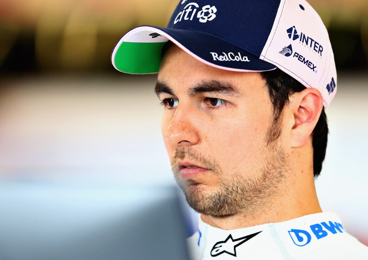 MELBOURNE, AUSTRALIA - MARCH 24: Sergio Perez of Mexico and Force India looks on in the garage during final practice for the Australian Formula One Grand Prix at Albert Park on March 24, 2018 in Melbourne, Australia. (Photo by Mark Thompson/Getty Images)