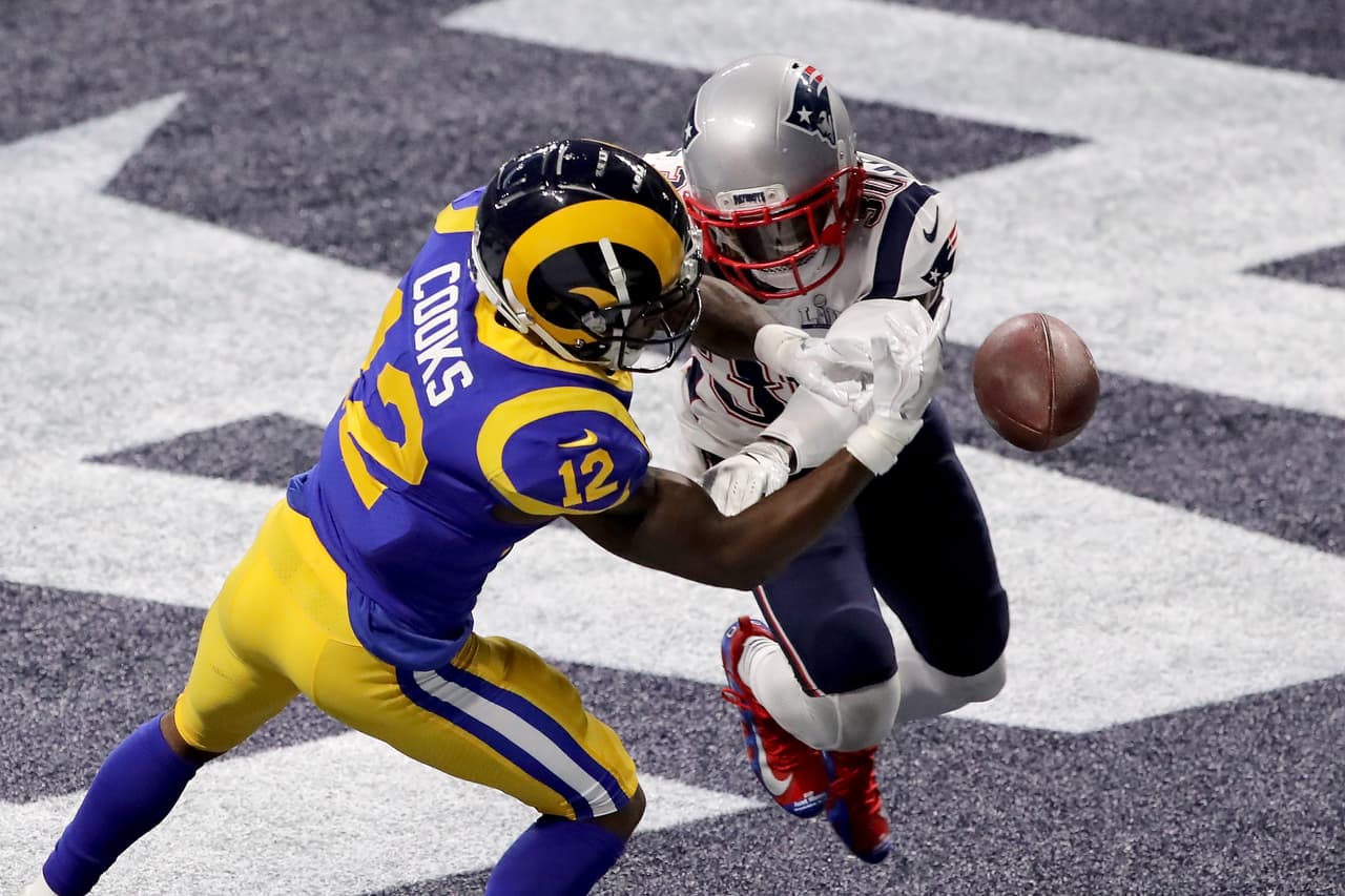 ATLANTA, GA - FEBRUARY 03: Brandin Cooks #12 of the Los Angeles Rams drops a pass in the endzone as he is defended by Jason McCourty #30 of the New England Patriots in the second half during Super Bowl LIII at Mercedes-Benz Stadium on February 3, 2019 in Atlanta, Georgia. (Photo by Elsa/Getty Images)