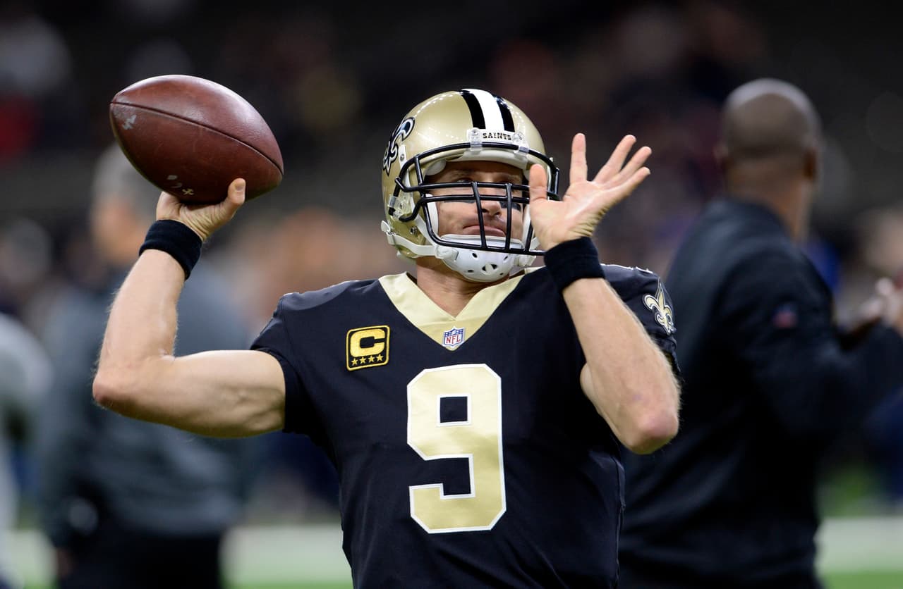 New Orleans Saints quarterback Drew Brees (9) warms up before an NFL football game against the Chicago Bears in New Orleans, Sunday, Oct. 29, 2017. (AP Photo/Bill Feig)