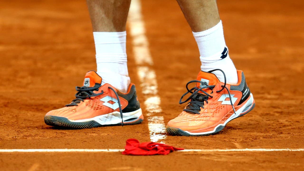 Al despedirse de cada torneo en 2019, Ferrer dejó su banda roja en la mitad de la cancha.