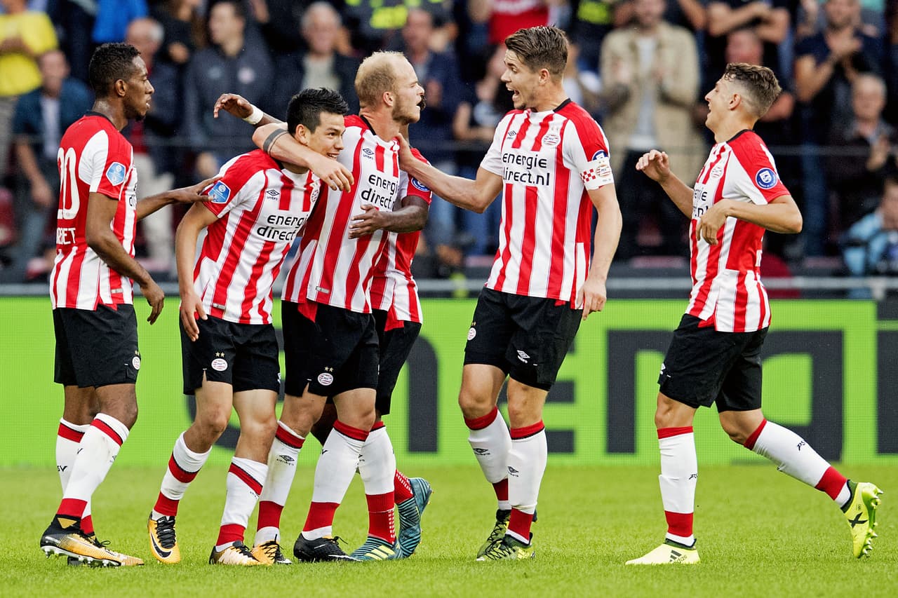 Eindhoven's Hirving Lozano (2ndL) celebrates with teammates after scoring during their Eredivisie soccer match Eindhoven (PSV) versus Alkmaar Zaanstreek (AZ) on August 12, 2017 in Eindhoven, in the Netherlands. / AFP PHOTO / ANP / Olaf KRAAK / Netherlands OUT - Belgium OUT (Photo credit should read OLAF KRAAK/AFP/Getty Images)