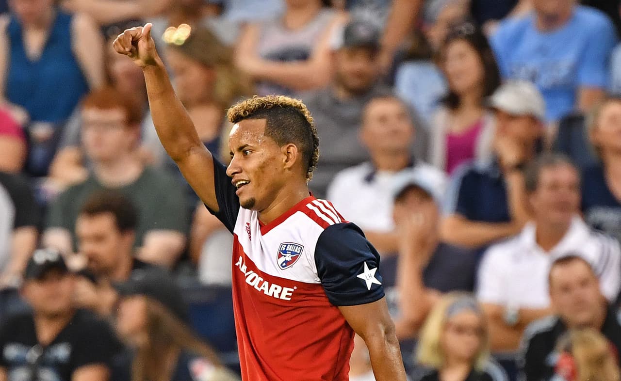 Jul 28, 2018; Kansas City, KS, USA; FC Dallas midfielder Michael Barrios (21) reacts after scoring a goal during the first half against Sporting Kansas City at Children's Mercy Park. Mandatory Credit: Peter G. Aiken/USA TODAY Sports