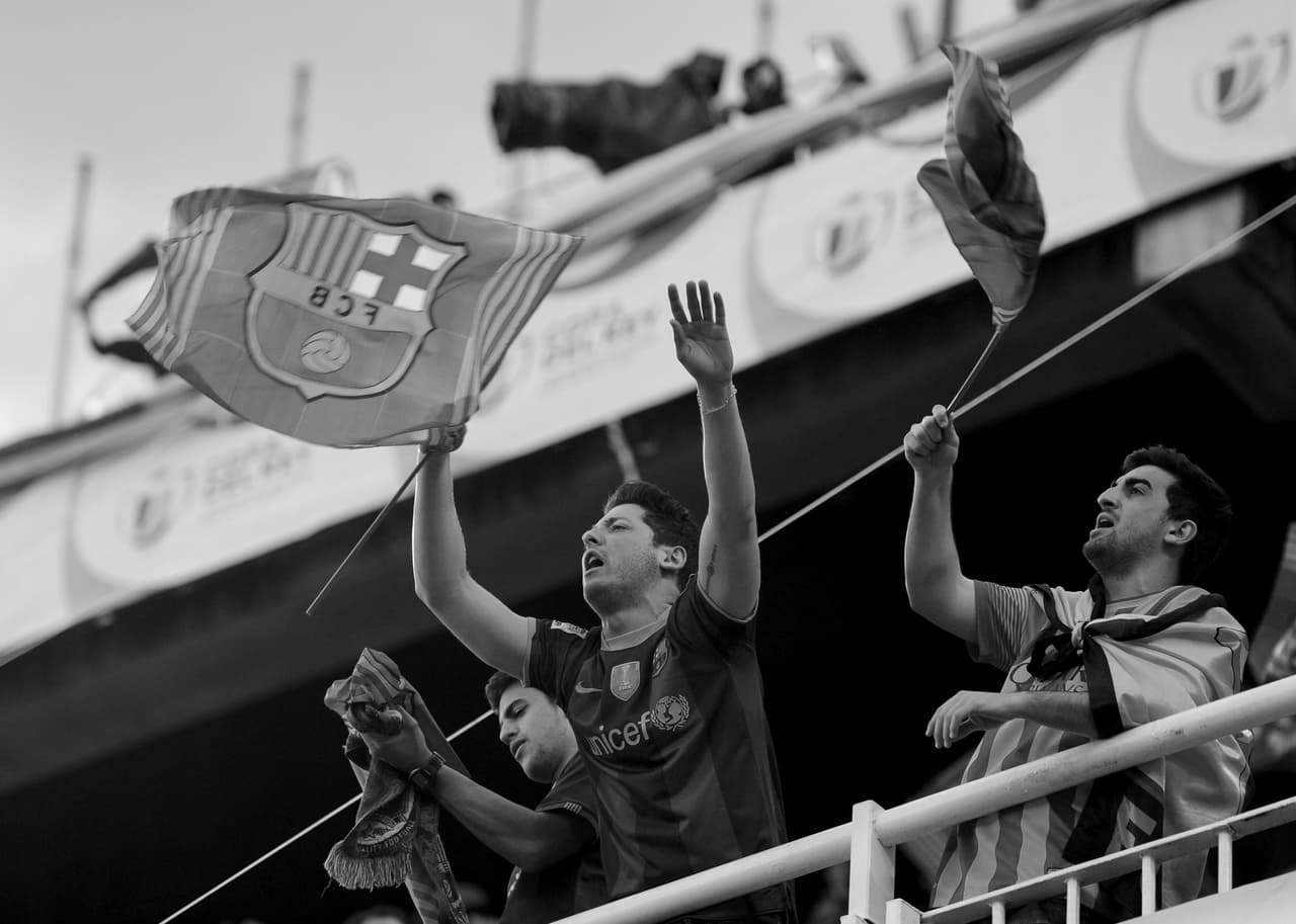 Barcelona's football fans react before the Spanish Copa del Rey (King's Cup) final "Clasico" football match FC Barcelona vs Real Madrid CF at the Mestalla stadium in Valencia on April 16, 2014. AFP PHOTO/ DANI POZO (Photo credit should read DANI POZO/AFP/Getty Images)