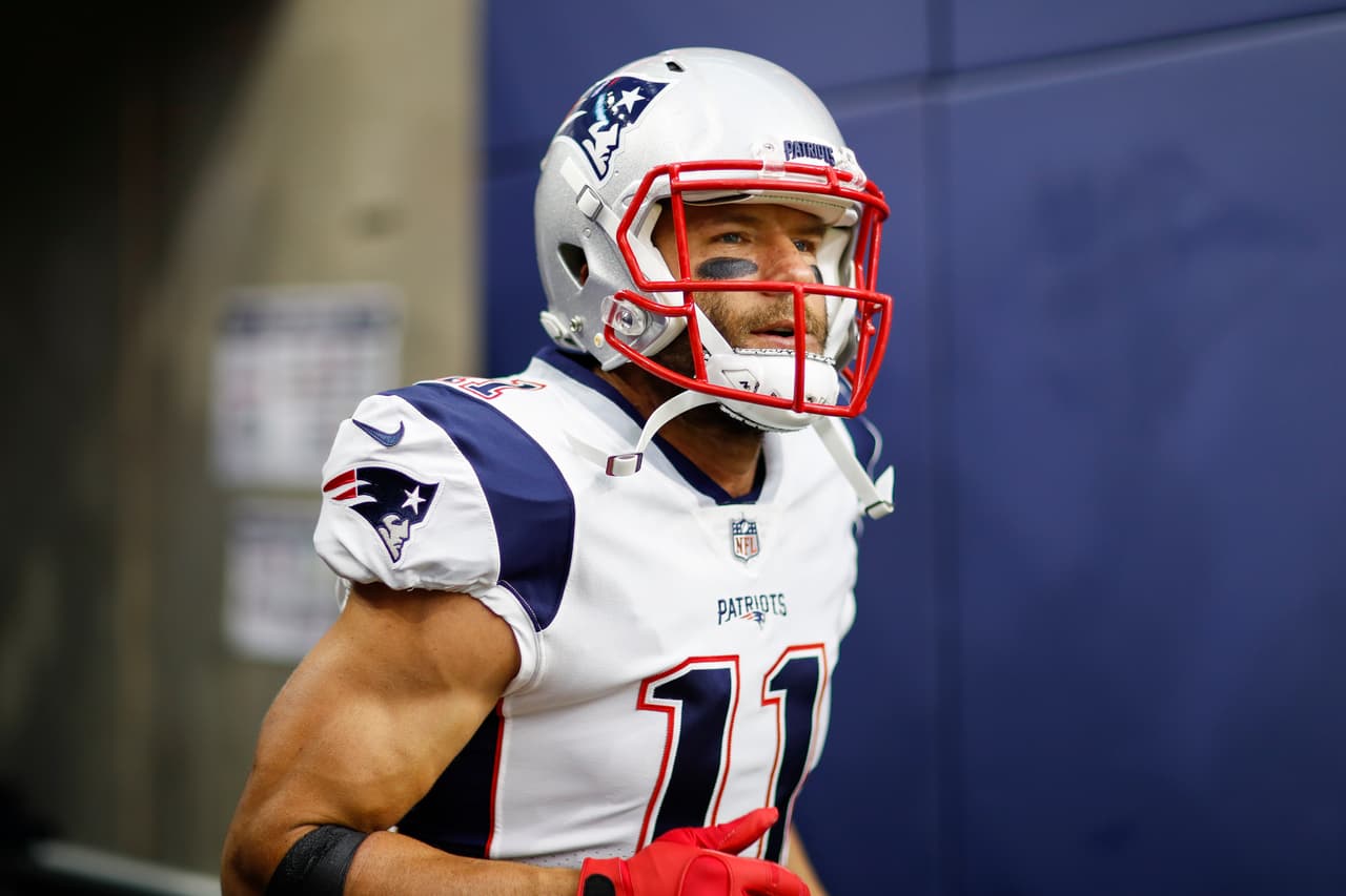 New England Patriots wide receiver Julian Edelman (11) runs onto the field prior to an NFL preseason football game against the Houston Texans on Saturday, Aug. 19, 2017 in Houston. Houston won 27-23. (Aaron M. Sprecher via AP)