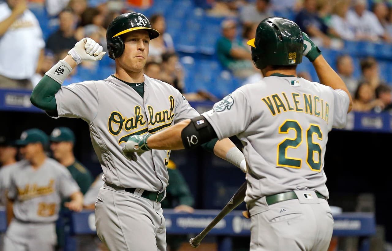 Con dos bambinazos de Valencia los Atléticos triunfan