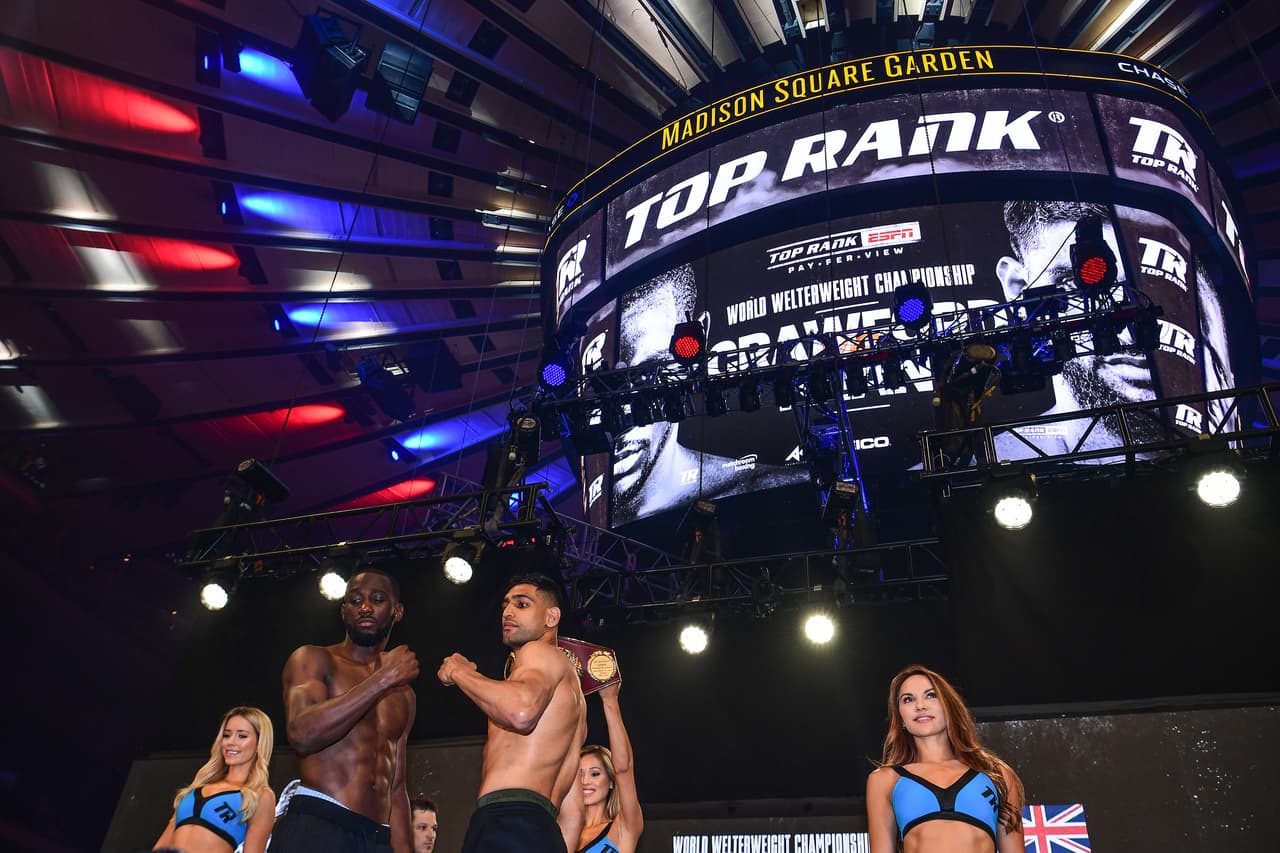 El campeón estadounidense Terence Crawford y el retador inglés Amir Khan combatirán en el Madison Square Garden este sábado por el título wélter de la OMB.