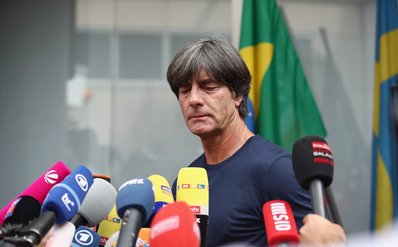 FRANKFURT AM MAIN, GERMANY - JUNE 28: Head coach Joachim Loew pauses during the return of the German national football team from the FIFA World Cup Russia 2018 at Frankfurt International Airport on June 28, 2018 in Frankfurt am Main, Germany. (Photo by Alex Grimm/Bongarts/Getty Images)