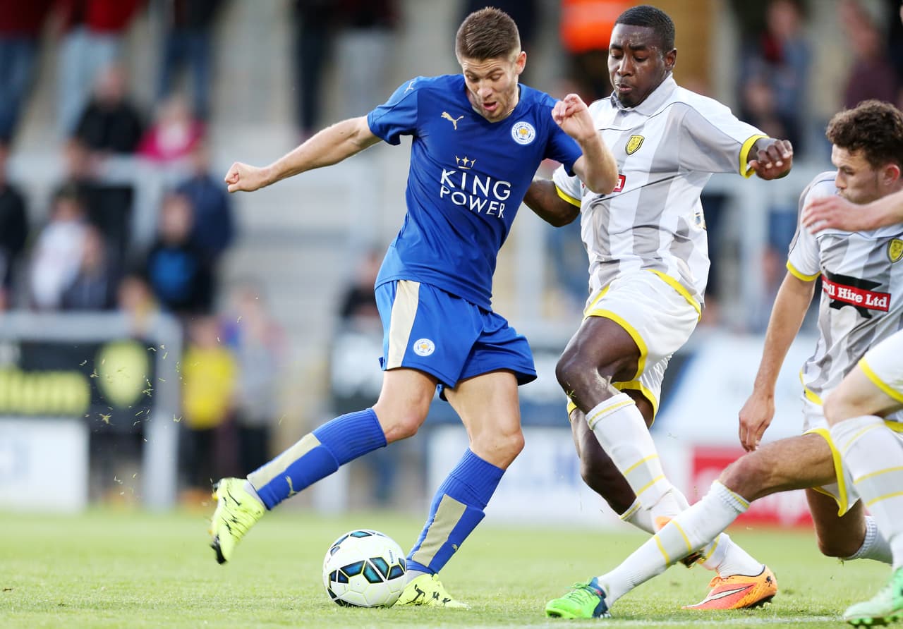 BURTON-UPON-TRENT, ENGLAND - JULY 28:Andrej Kramaric of Leicester City in action with Kelvin Maynard of Burton Albion during the pre-season friendly between Burton Albion and Leicester City at Pirelli Stadium on July 28, 2015 in Burton-upon-Trent, England. (Photo by Plumb Images/Leicester City FC via Getty Images)
