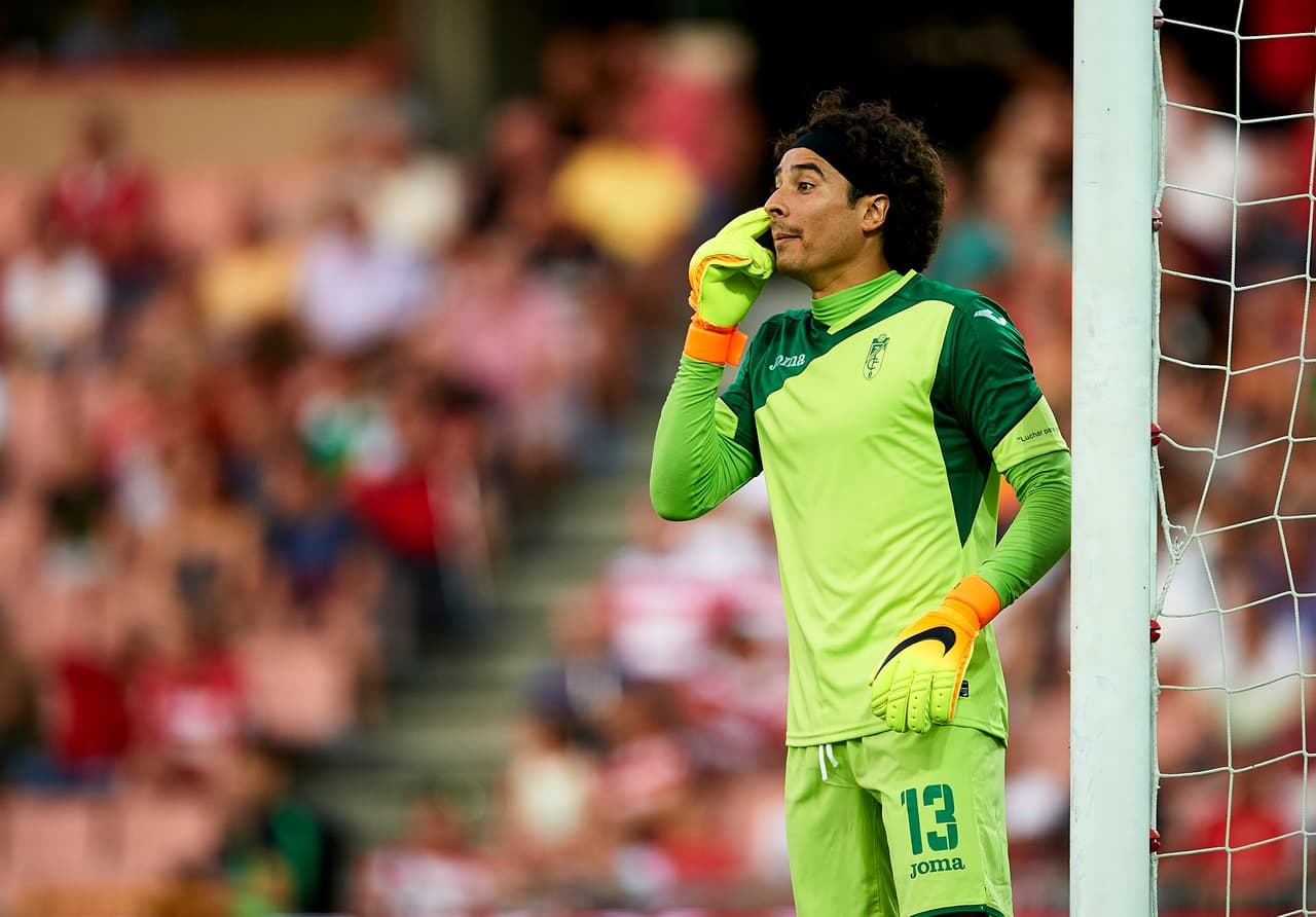 GRANADA, SPAIN - AUGUST 02: Guillermo Ochoa of Granada FC reacts during a friendly match between Granada FC and Sevilla FC at Estadio Nuevo los Carmenes on August 2, 2016 in Granada, Spain. (Photo by Aitor Alcalde/Getty Images)