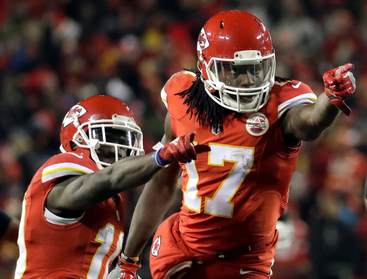 Kansas City Chiefs wide receiver Chris Conley (17) and wide receiver Tyreek Hill (19) point during the first half of an NFL football game against the Oakland Raiders in Kansas City, Mo., Thursday, Dec. 8, 2016. (AP Photo/Charlie Riedel)
