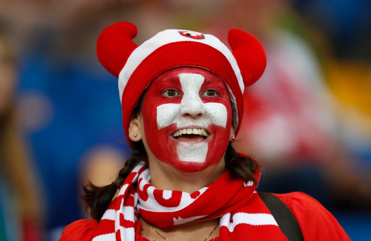 A Switzerland's fan waits for the start of the group E match between Brazil and Switzerland at the 2018 soccer World Cup in the Rostov Arena in Rostov-on-Don, Russia, Sunday, June 17, 2018. (AP Photo/Darko Vojinovic)