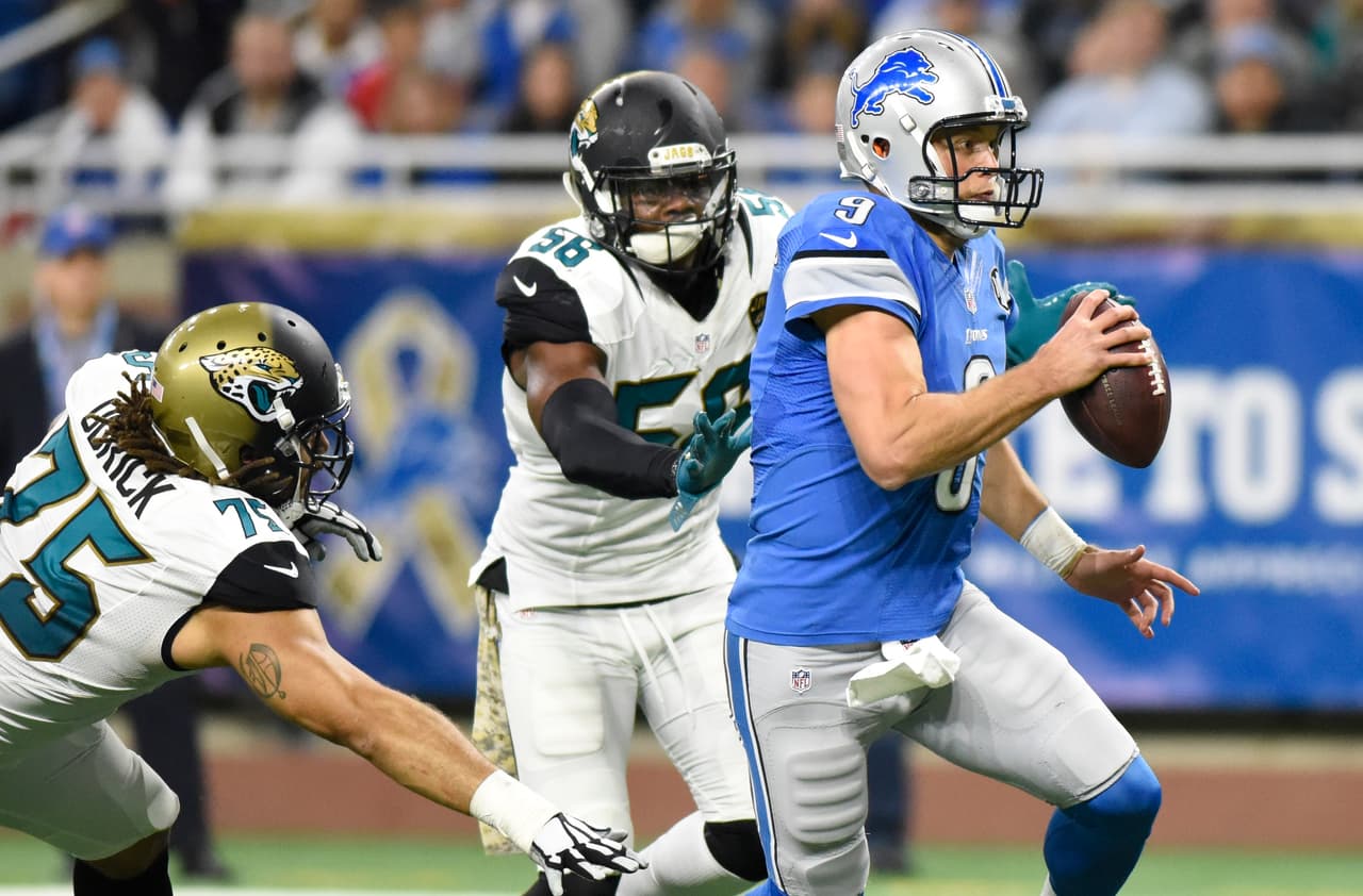 Detroit Lions quarterback Matthew Stafford scrambles during the first half of an NFL football game against the Jacksonville Jaguars, Sunday, Nov. 20, 2016 in Detroit. (AP Photo/Jose Juarez)