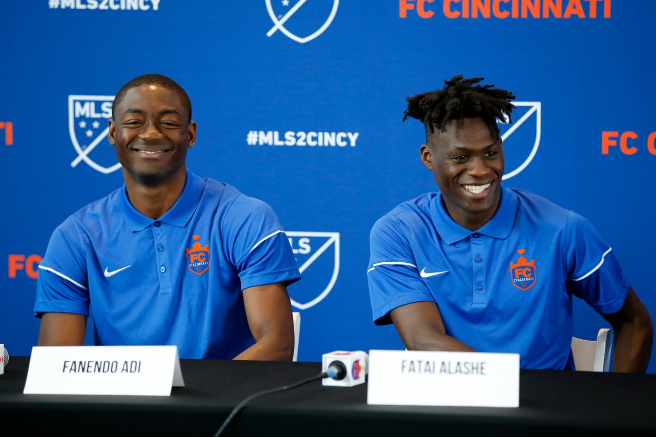 Jul 30, 2018; Cincinnati, OH, USA; FC Cincinnati signees Fanendo Adi and Fatai Alashe take questions during a press conference at Nippert Stadium. Mandatory Credit: Sam Greene/Cincinnati Enquirer via USA TODAY NETWORK