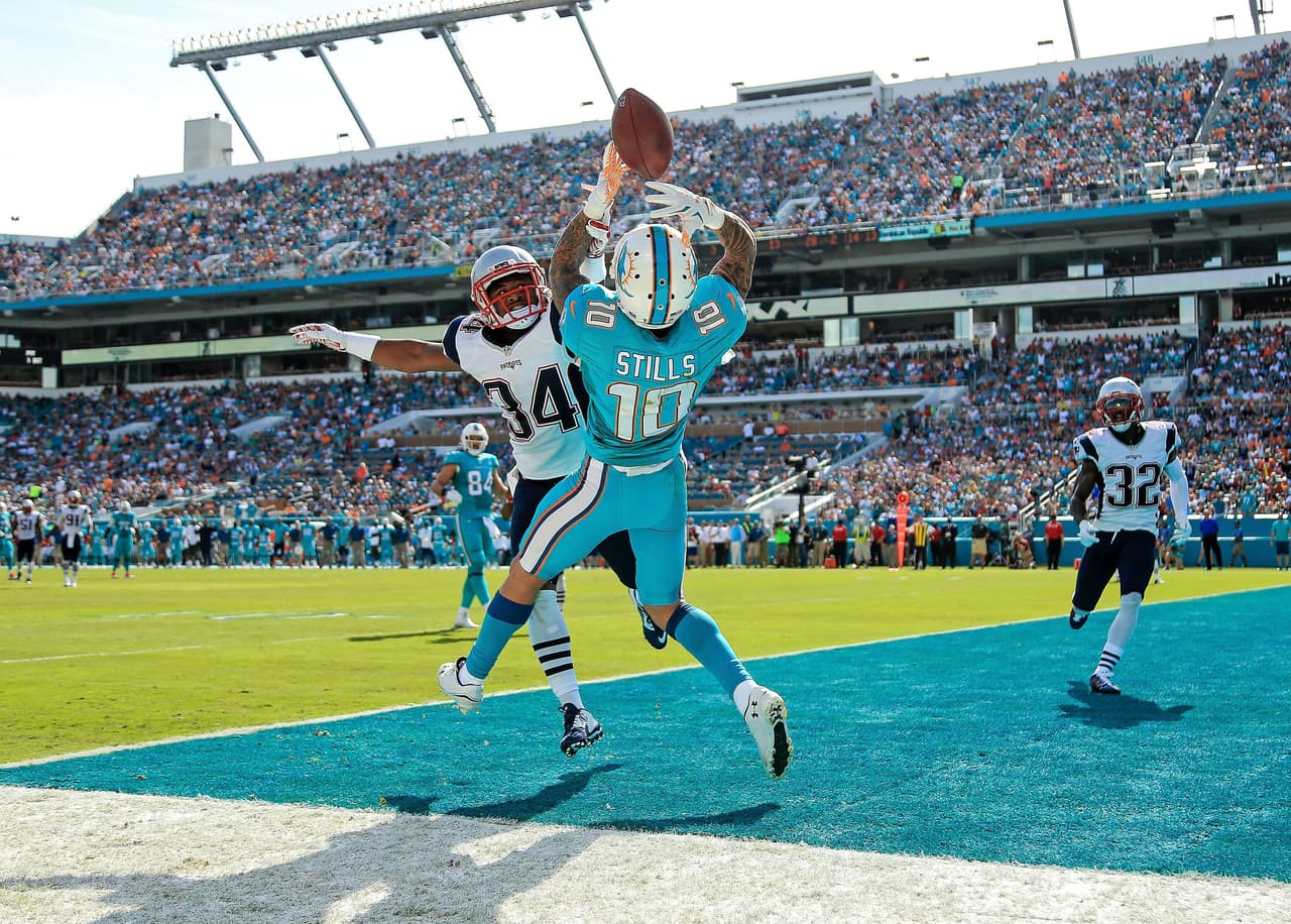 Tom Brady tuvo un mal día en Florida y los Patriots fueron derrotados 20-10 por Dolphins, y con ello la posibilidad de ser los sembrados N°1 AFC. Checa las mejores tomas de este duelo.