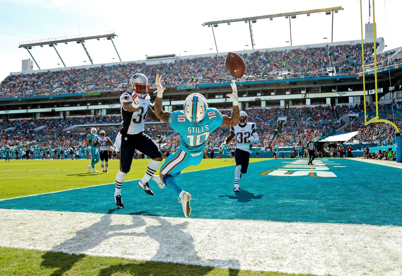 Tom Brady tuvo un mal día en Florida y los Patriots fueron derrotados 20-10 por Dolphins, y con ello la posibilidad de ser los sembrados N°1 AFC. Checa las mejores tomas de este duelo.