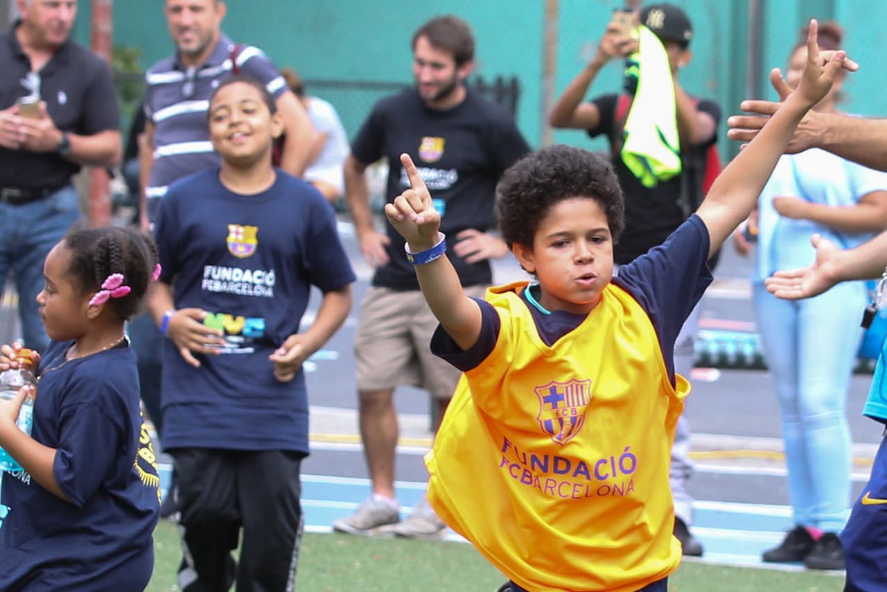 NEW YORK, NY - SEPTEMBER 06: FC Barcelona and the NY Department of Education host a camp featuring Ronaldinho and children from MS 129 to bring soccer and positive values to the five New York City boroughs on September 6, 2016 in New York City borough of the Bronx. (Photo by Ed Mulholland/Getty Images for FC Barcelona)