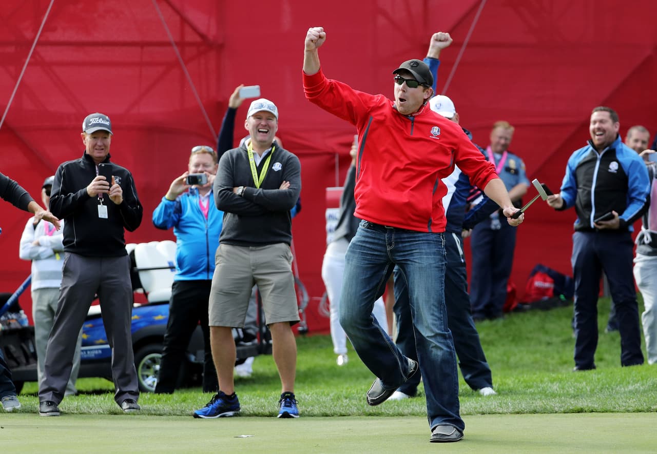 CHASKA, MN - SEPTEMBER 29: Fan David Johnson of North Dakota reacts after being pulled from the crowd and making a putt on the eighth green during practice prior to the 2016 Ryder Cup at Hazeltine National Golf Club on September 29, 2016 in Chaska, Minnesota. (Photo by David Cannon/Getty Images)