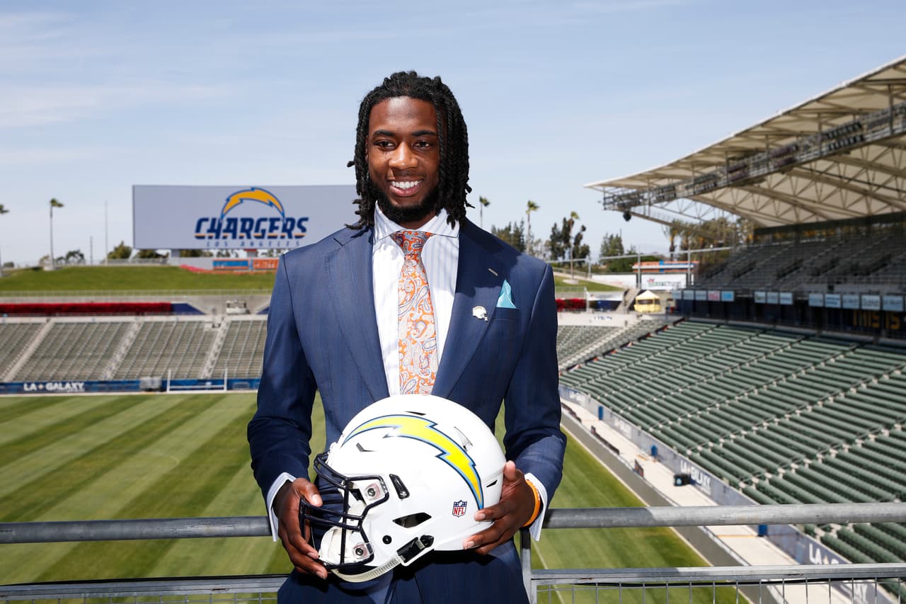 Los Angeles Chargers first-round draft pick Mike Williams poses for photos after an NFL football news conference at the StubHub Center Friday, April 28, 2017, in Carson, Calif. (AP Photo/Jae C. Hong)