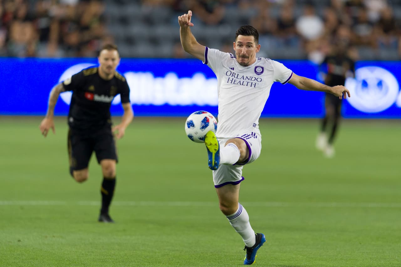 Jul 7, 2018; Los Angeles, CA, CA, USA; Orlando City SC midfielder Sacha Kljestan (16) attempts to handle a pass during the first half against Los Angeles FC at Banc of California Stadium. Mandatory Credit: Kelvin Kuo-USA TODAY Sports