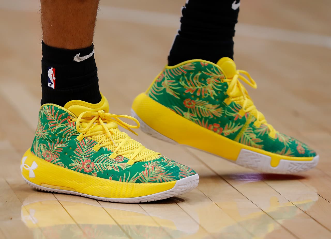 Los tenis de Patty Mills #8 de San Antonio Spurs.