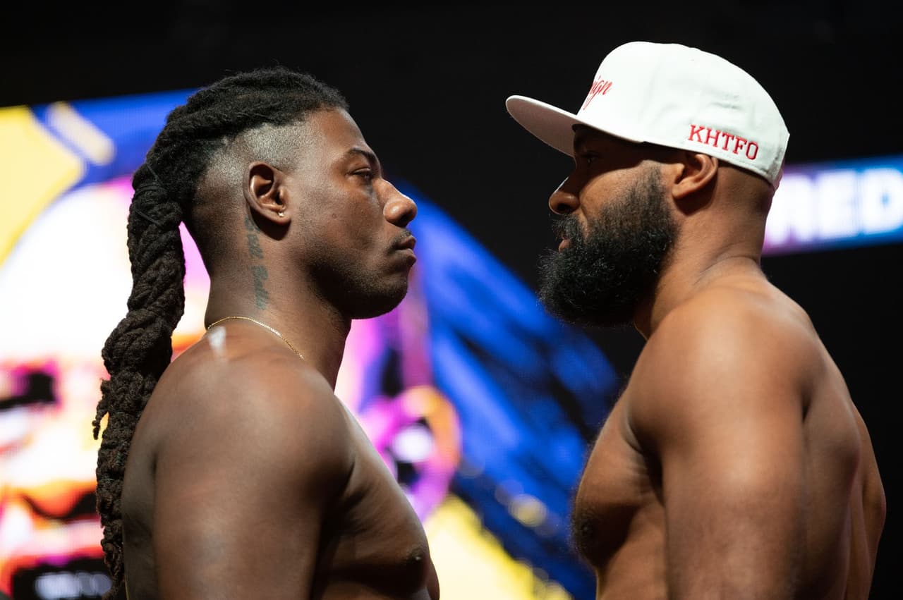 Gerald Washington (236.5 libras) y Charles Martin (254 libras) en eliminatoria de la FIB en peso completo.