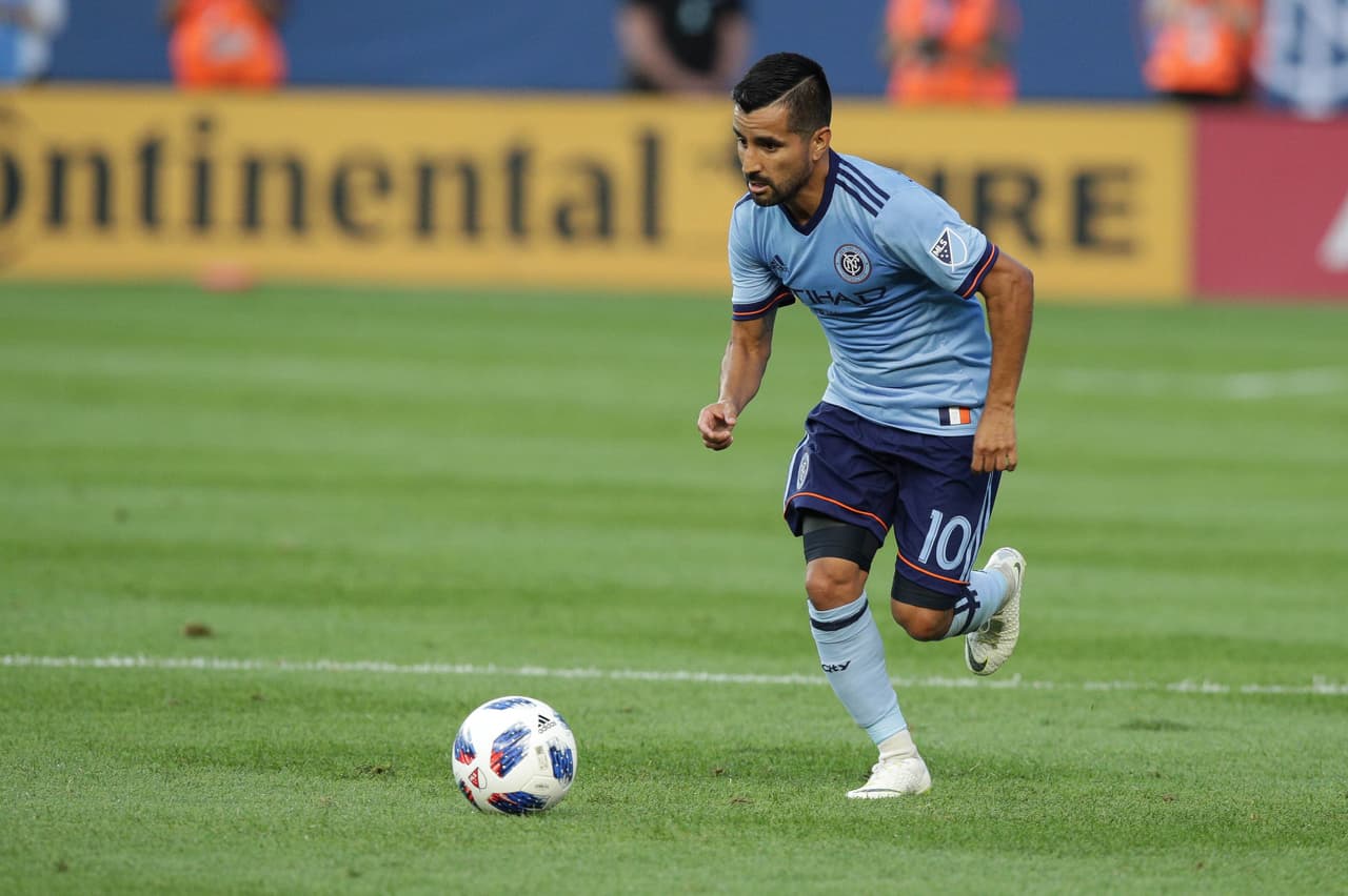 Jul 8, 2018; New York, NY, USA; New York City FC midfielder Maximiliano Moralez (10) controls the ball against the New York Red Bulls during the first half at Yankee Stadium. Mandatory Credit: Vincent Carchietta-USA TODAY Sports