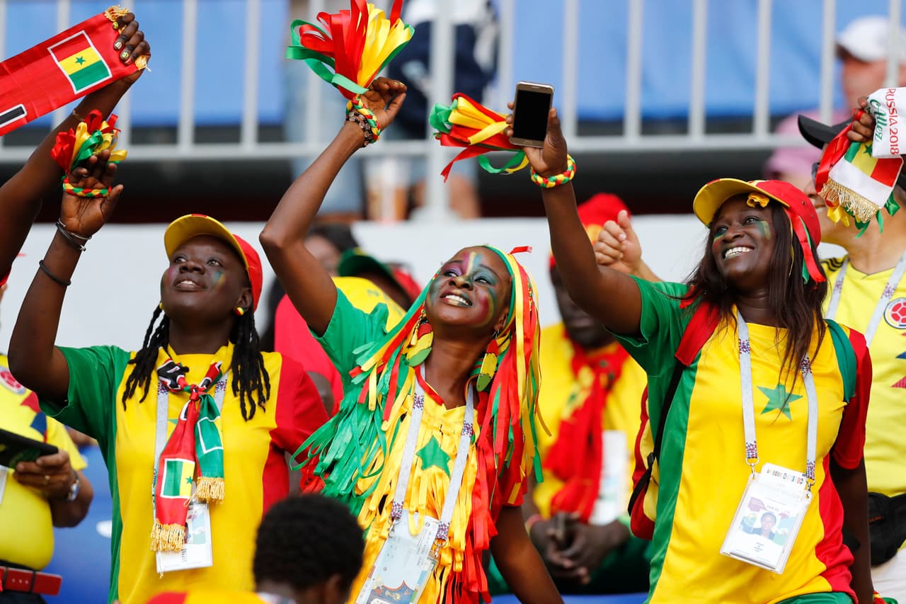 Supporters of Senegal cheer their team prior to the group H match between Senegal and Colombia, at the 2018 soccer World Cup in the Samara Arena in Samara, Russia, Thursday, June 28, 2018. (AP Photo/Efrem Lukatsky)