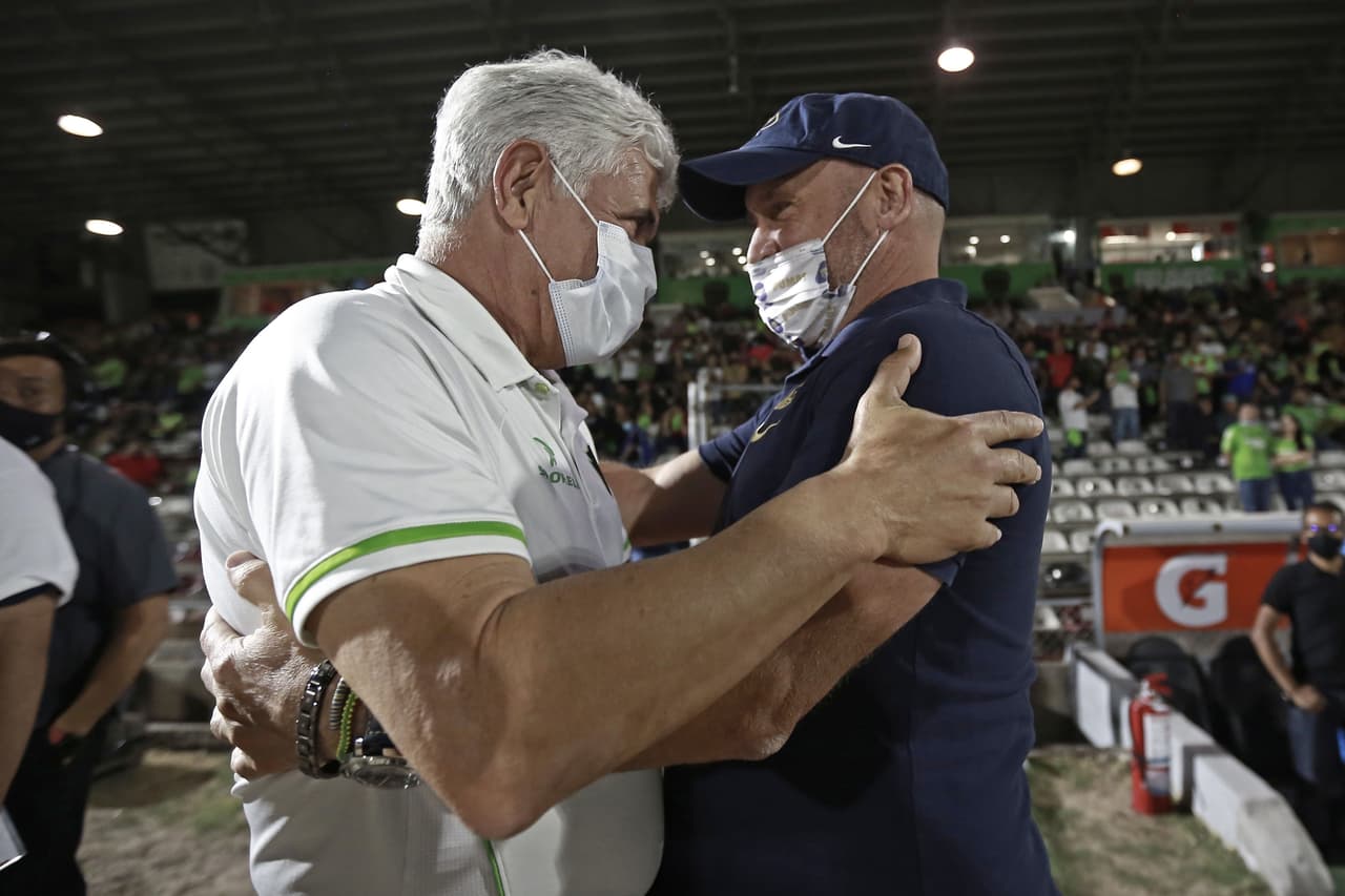 Tuca y Lillini se saludaron con efusividad.