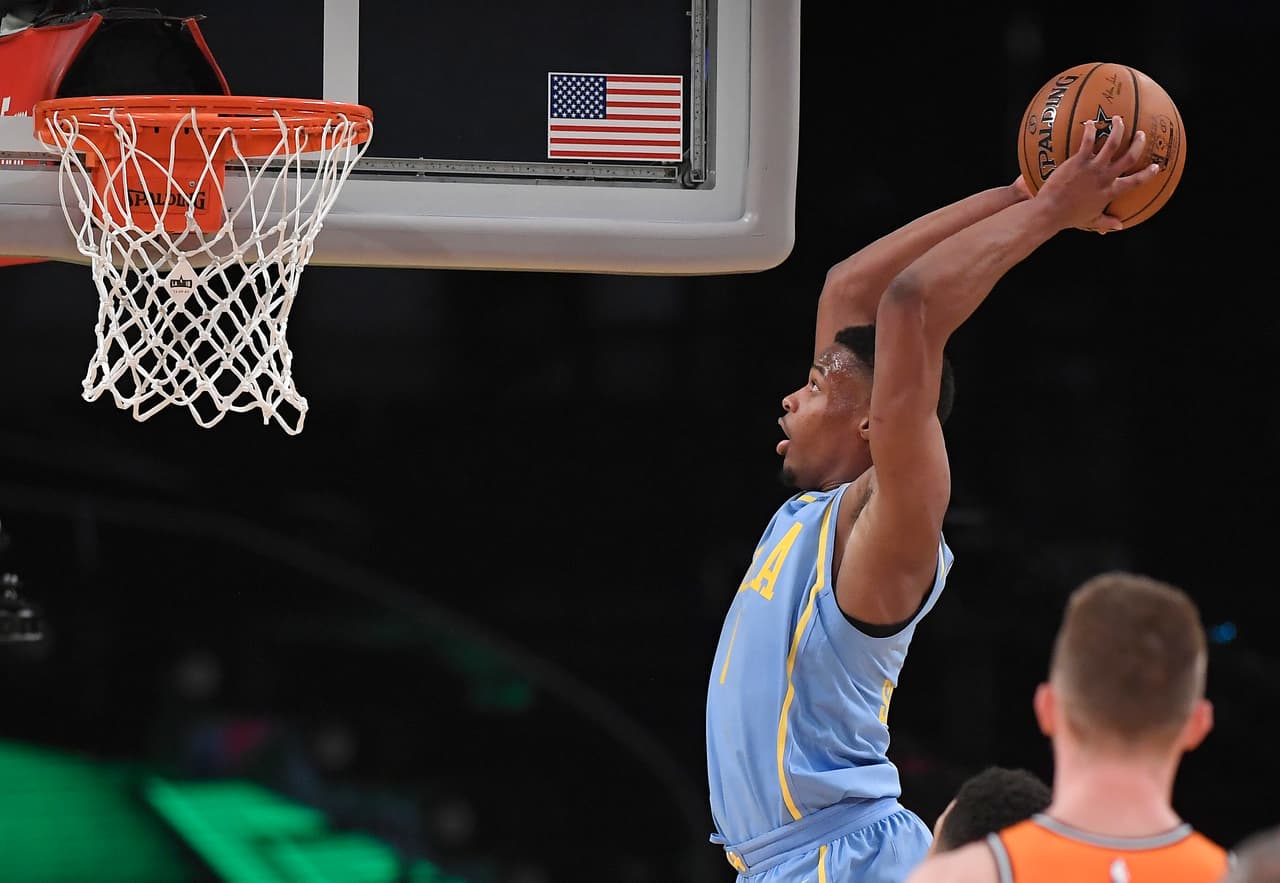 U.S. Team's Dennis Smith Jr., of the Dallas Mavericks, dunks during the NBA All-Star Rising Stars basketball game against the World Team, Friday, Feb. 16, 2018, in Los Angeles. (AP Photo/Mark J. Terrill)