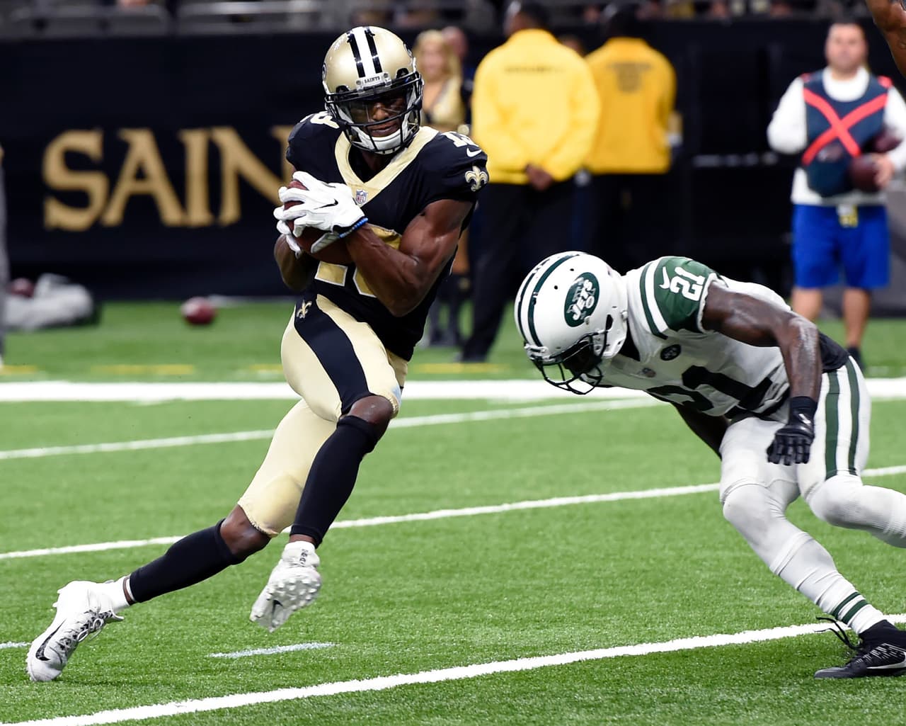 Michael Thomas, de los Saints de Nueva Orleáns, anota frente a Morris Clairborne, de los Jets de Nueva York, durante el encuentro realizado el domingo 17 de diciembre de 2017 (AP Foto/Bill Feig)