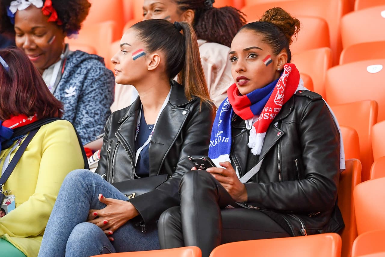 Relatives and family members of France's players are seen in the stands before the Russia 2018 World Cup Group C football match between France and Peru at the Ekaterinburg Arena in Ekaterinburg on June 21, 2018. Marine Tolisso (R), sister of France's midfielder Corentin Tolisso. (Photo by FRANCK FIFE / AFP) / RESTRICTED TO EDITORIAL USE - NO MOBILE PUSH ALERTS/DOWNLOADS (Photo credit should read FRANCK FIFE/AFP/Getty Images)