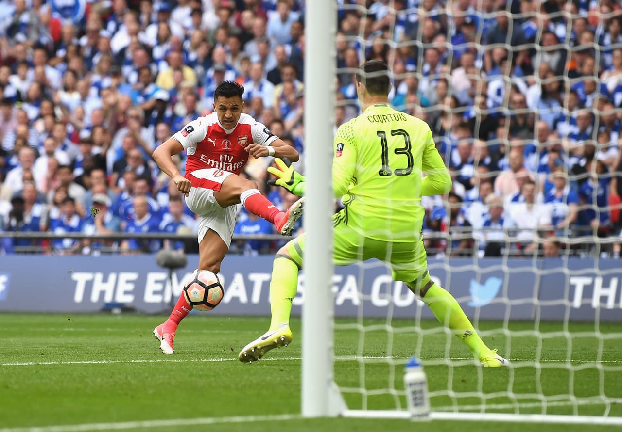 LONDON, ENGLAND - MAY 27: Alexis Sanchez of Arsenal scores his teams first goal during The Emirates FA Cup Final between Arsenal and Chelsea at Wembley Stadium on May 27, 2017 in London, England. (Photo by Mike Hewitt/Getty Images)