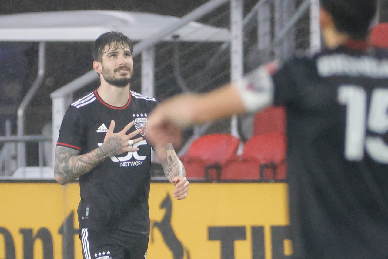 May 7, 2022; Washington, District of Columbia, USA; D.C. United forward Taxiarchis Fountas (11) celebrates after scoring a goal against Houston Dynamo in the first half at Audi Field. Mandatory Credit: Geoff Burke-USA TODAY Sports