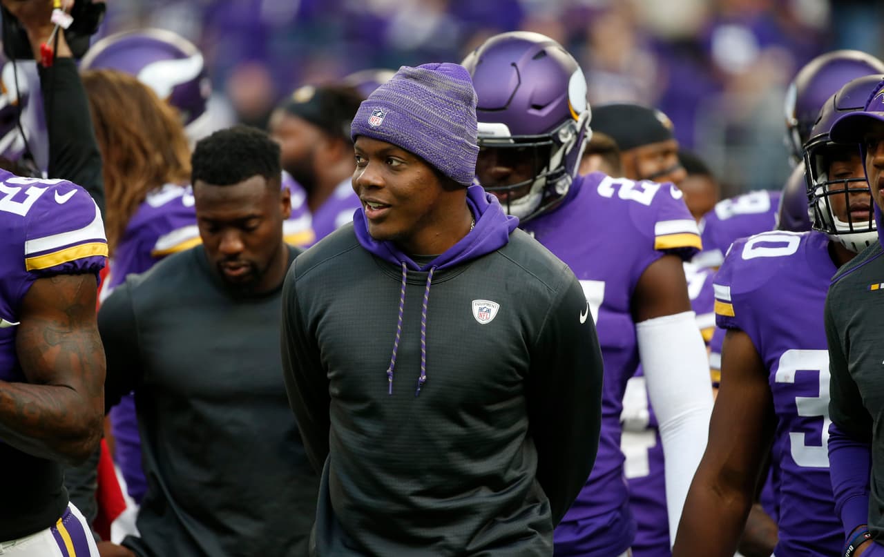Minnesota Vikings quarterback Teddy Bridgewater, center, walks on the field with teammates during the first half of an NFL football game against the Baltimore Ravens, Sunday, Oct. 22, 2017, in Minneapolis. (AP Photo/Bruce Kluckhohn)