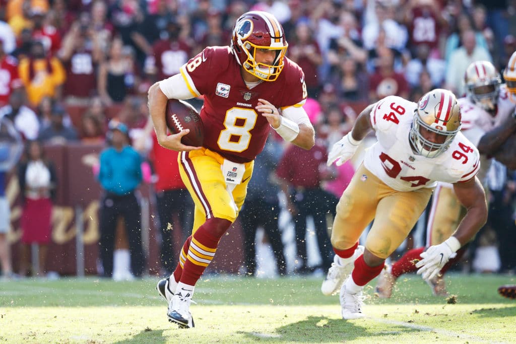 El mariscal de campo Kirk Cousins lanzó para dos touchdowns y anotó una vez y a pesar de su inconsistencia en el emparrillado llevó a los Redskins de Washington a un triunfo por 26-24 sobre los 49ers de San Francisco, que siguen sin conocer el triunfo en lo que va de temporada.
